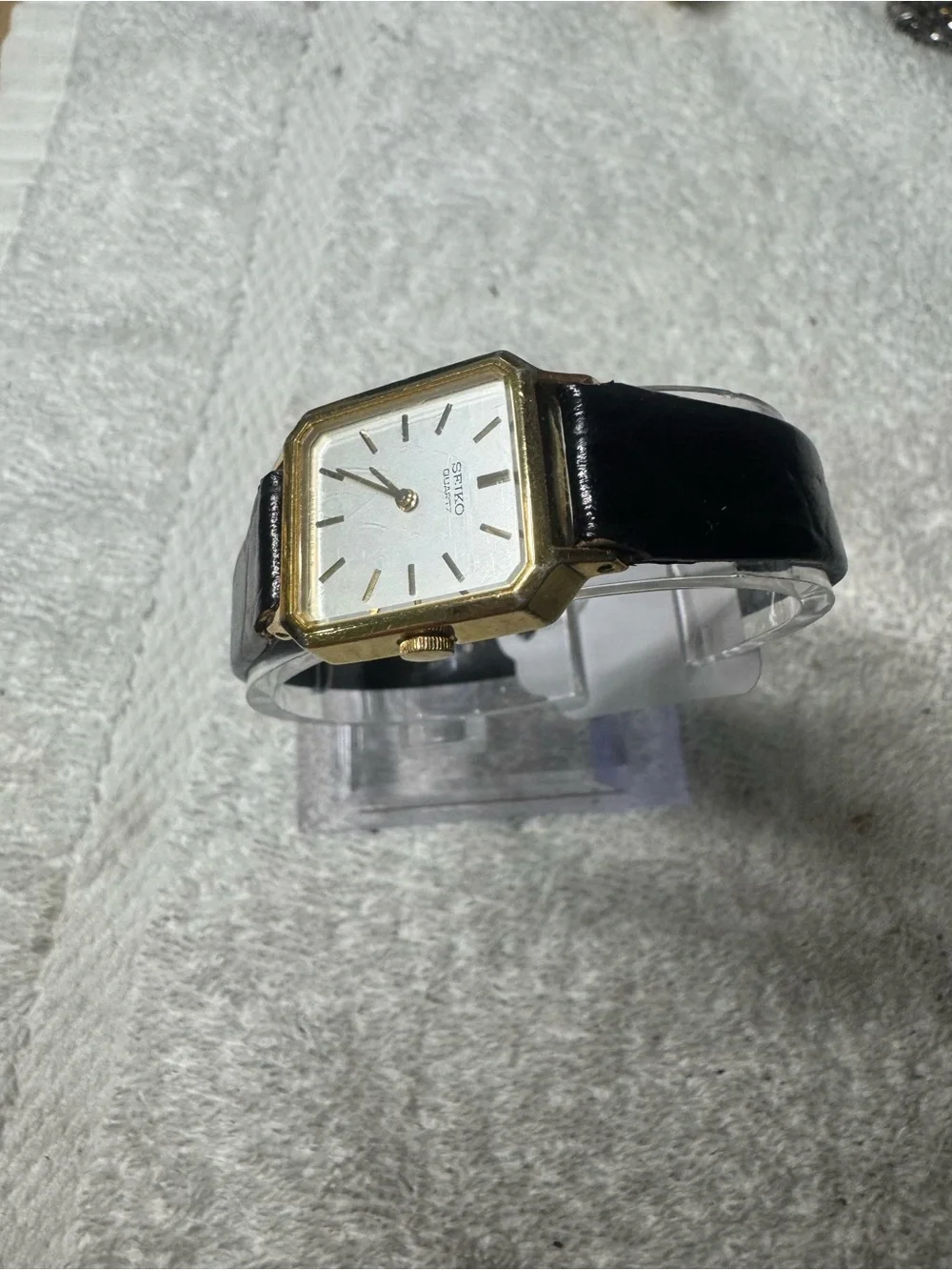Seiko Gold Tone Square Watch with Silver Dial and Black Strap
